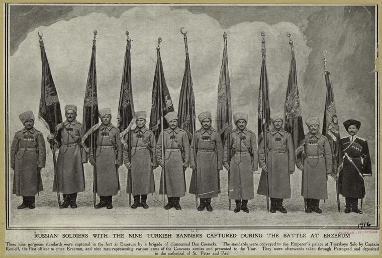 Russian troops posing with captured Ottoman flags at Erzurum, February 1916.