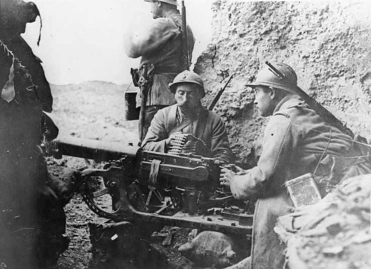 French with captured German gun, circa spring 1916.