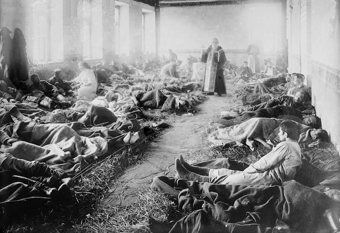 Russian priest prays for the wounded, Russian Front, date and place uncertain.